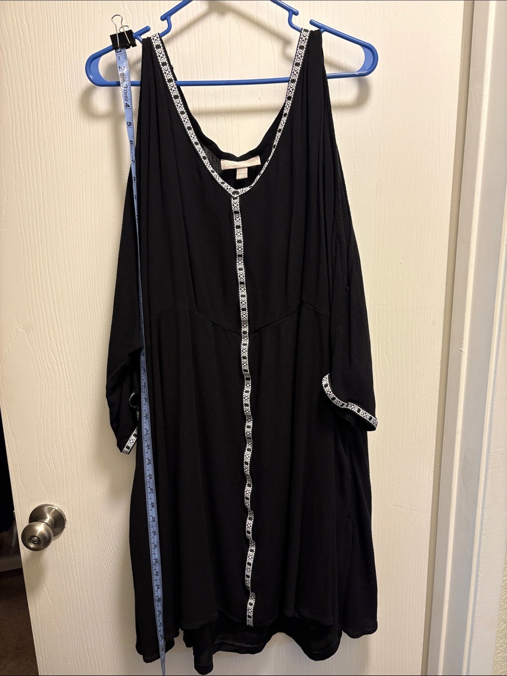 Woman Within Black Asymmetrical Dress with White Trim